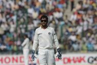 Dhoni was India's captain during Rohit's debut Test. Source: Getty